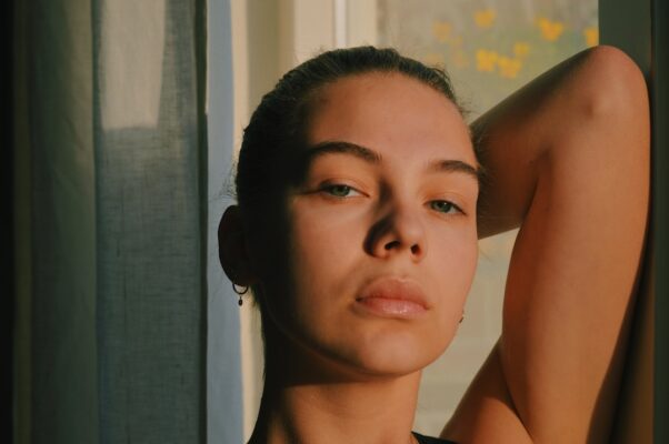 How can a dermatologist help with acne?