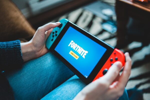 How do I deal with online bullies in games?