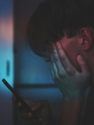 What are the effects of acne on self-esteem?