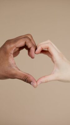 What is the difference between racism and prejudice?