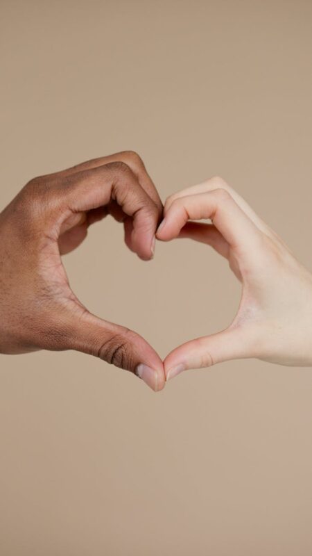 What is the difference between racism and prejudice?